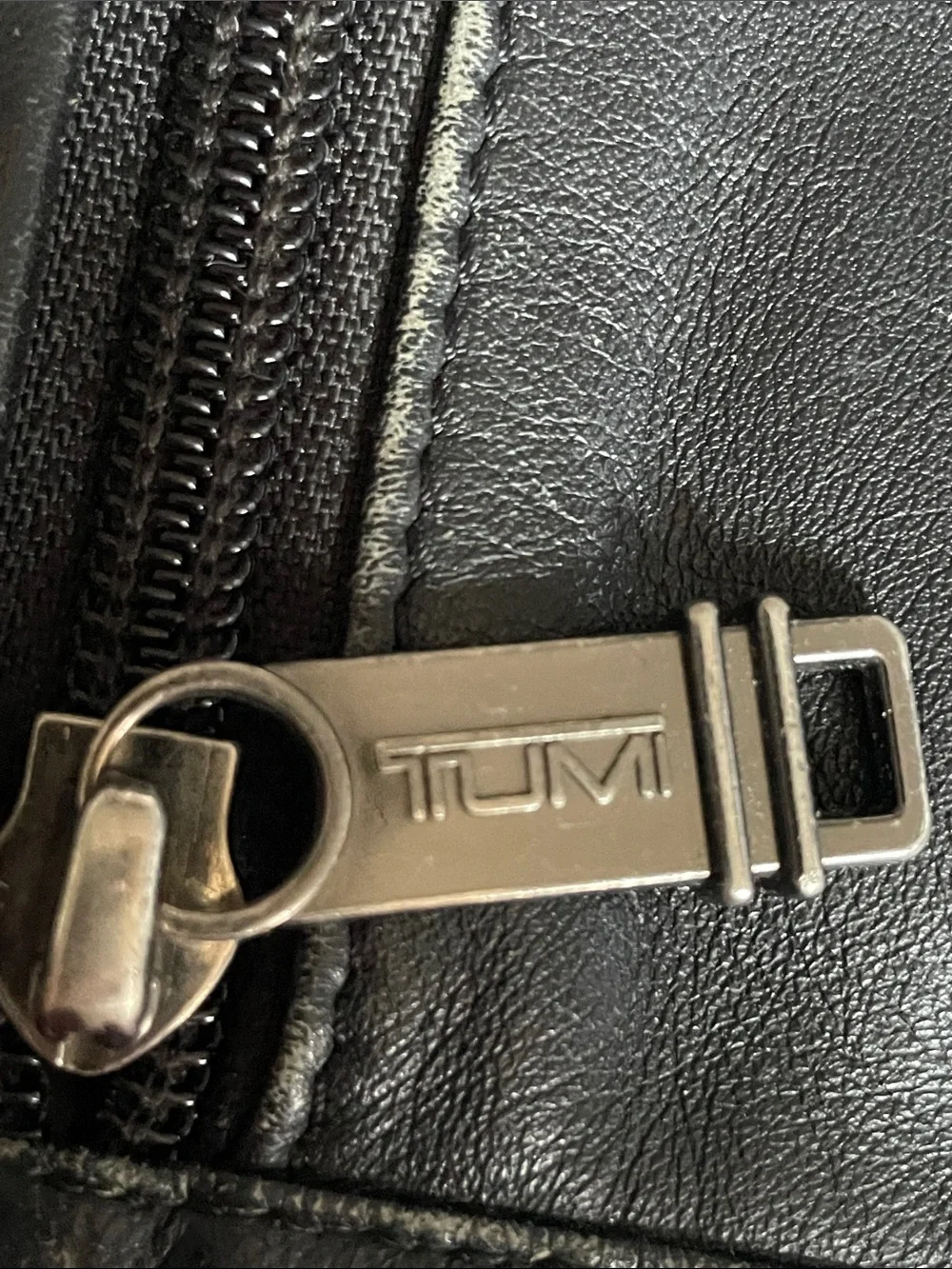 Tumi  Small  Multi  Compartment Black Leather Messenger Bag. Alpha Series.